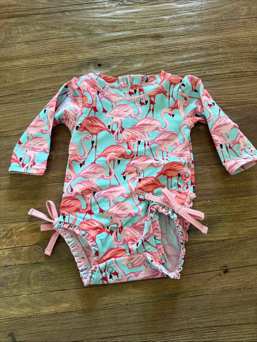 Ruffle Butts Pink Flamingo Long Sleeve Rashguard - Aqua Background